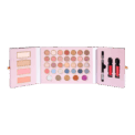 Maxi Palette Winter Sparkle : 35 fards à paupières, 2 blushs, highlighter, bronzer, pinceau double embout, 2 gloss. Parfait pour looks festifs variés