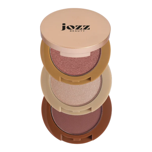 Trois fards à paupières ouverts aux tons rosé, champagne et brun du Trio Yeux JOZZ Beauty